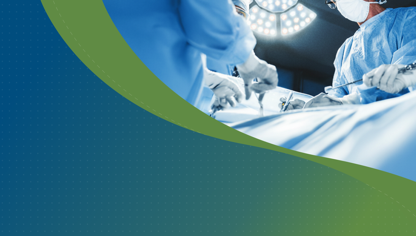 Surgical team in blue scrubs and gloves performing an operation under bright operating theatre lights